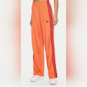 Adidas Vibrant Orange Pants with Bold Red Accents
